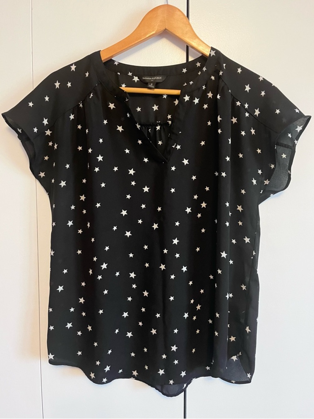 Banana Republic Black Short Sleeve top, white star print, size S. Like new!